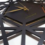 ساعت دیواری اسلیمی با رنگ مشکی جنس چوبی MDF