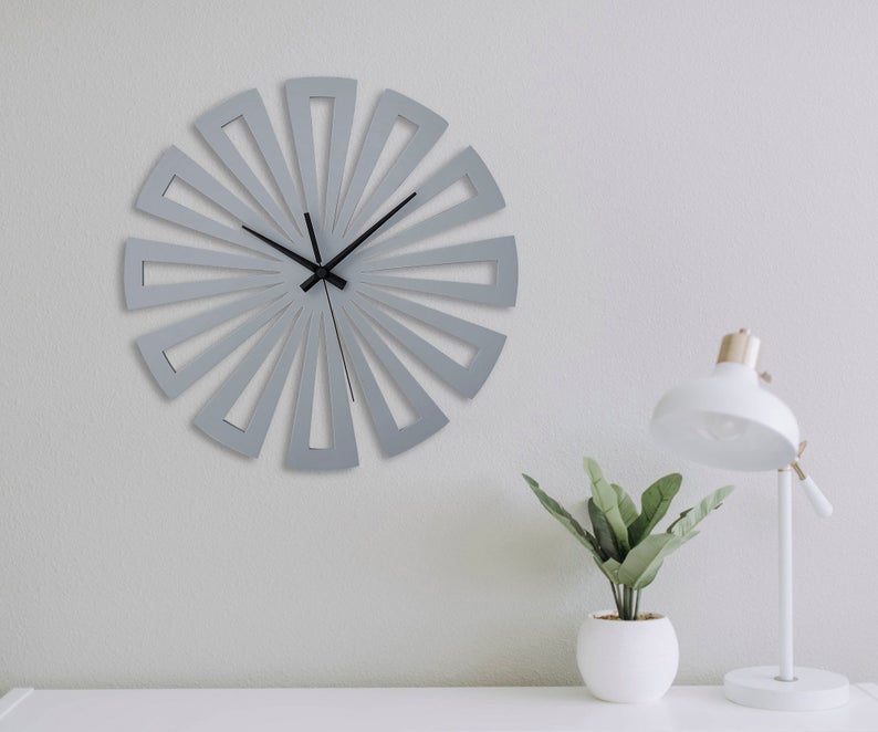 ساعت دیواری مدل چرخی چوبی در سه رنگ مختلف