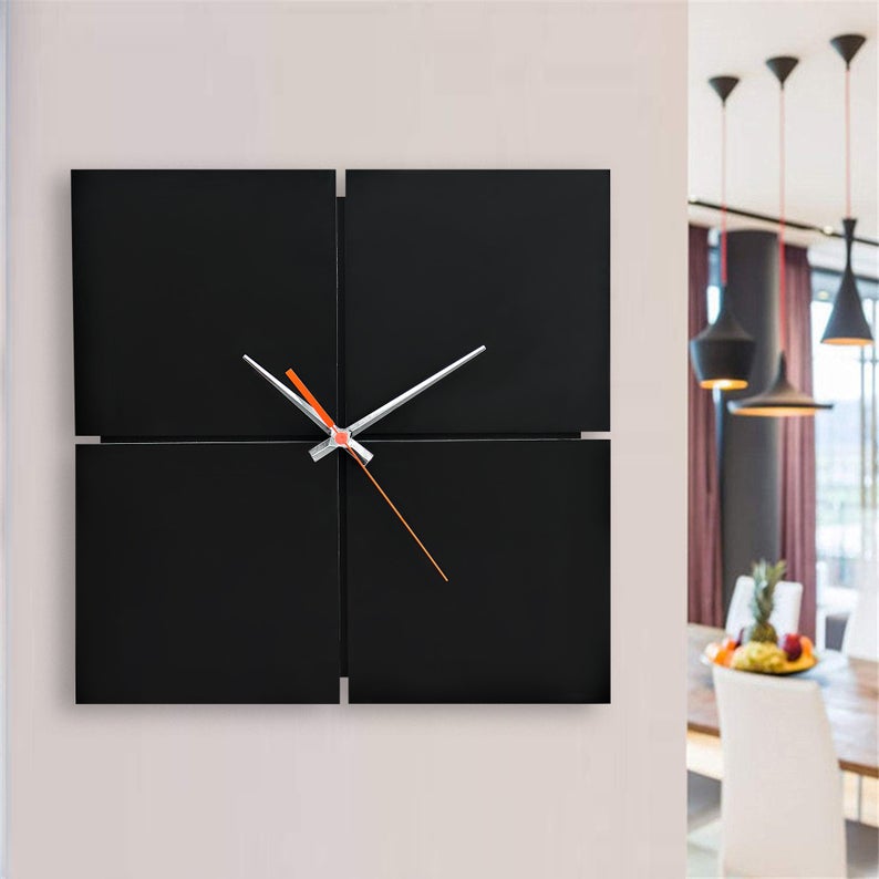 ساعت دیواری مدل Black hole با رنگ مشکی و طراحی زیبا