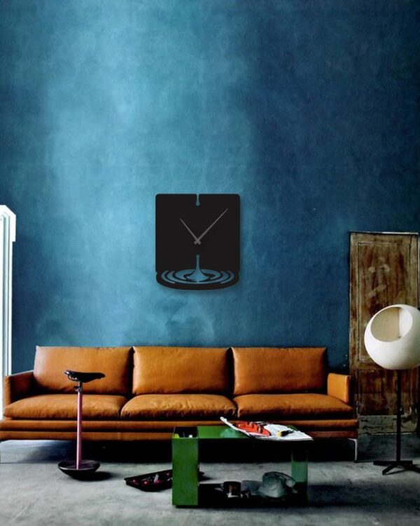 ساعت دیواری مشکی طرح موج قطره جنس شیشه نشکن (پلکسی)